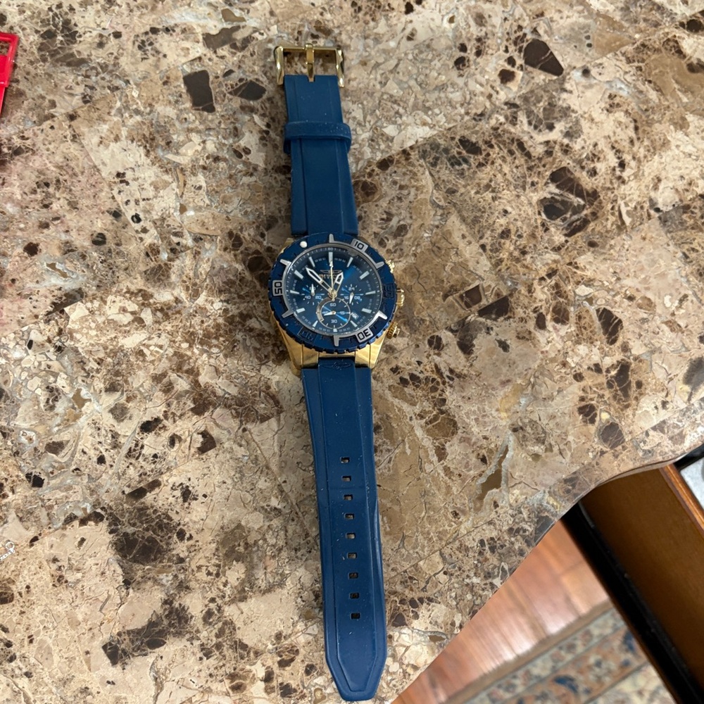 Blue and Gold Invicta Watch. Great condition